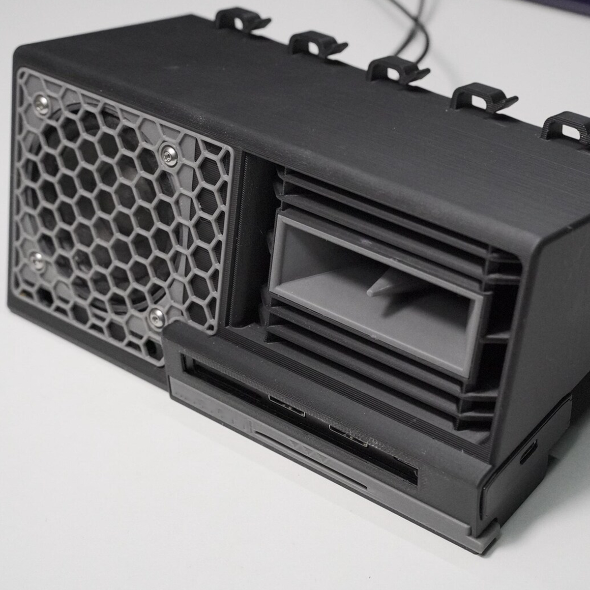 Six-In-One Under-Monitor Desktop Multi-Function Dock, Integrated Audio Speaker, NVMe Storage Bay And Multi-Port Media Hub